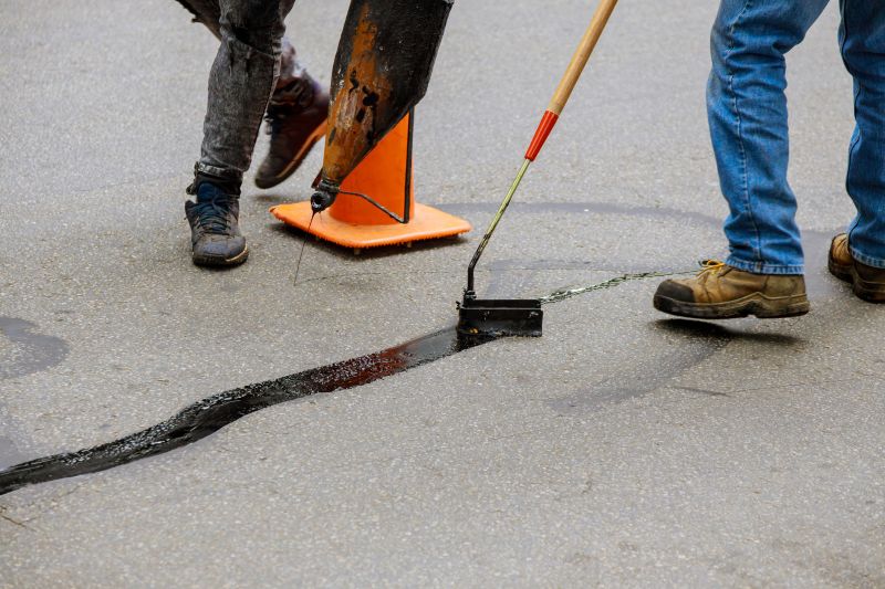 Local Asphalt Sealing pros at work